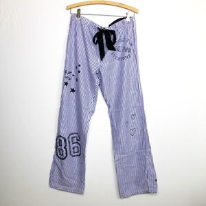 Victoria’s Secret pink blue and white striped graphic lounge pants.